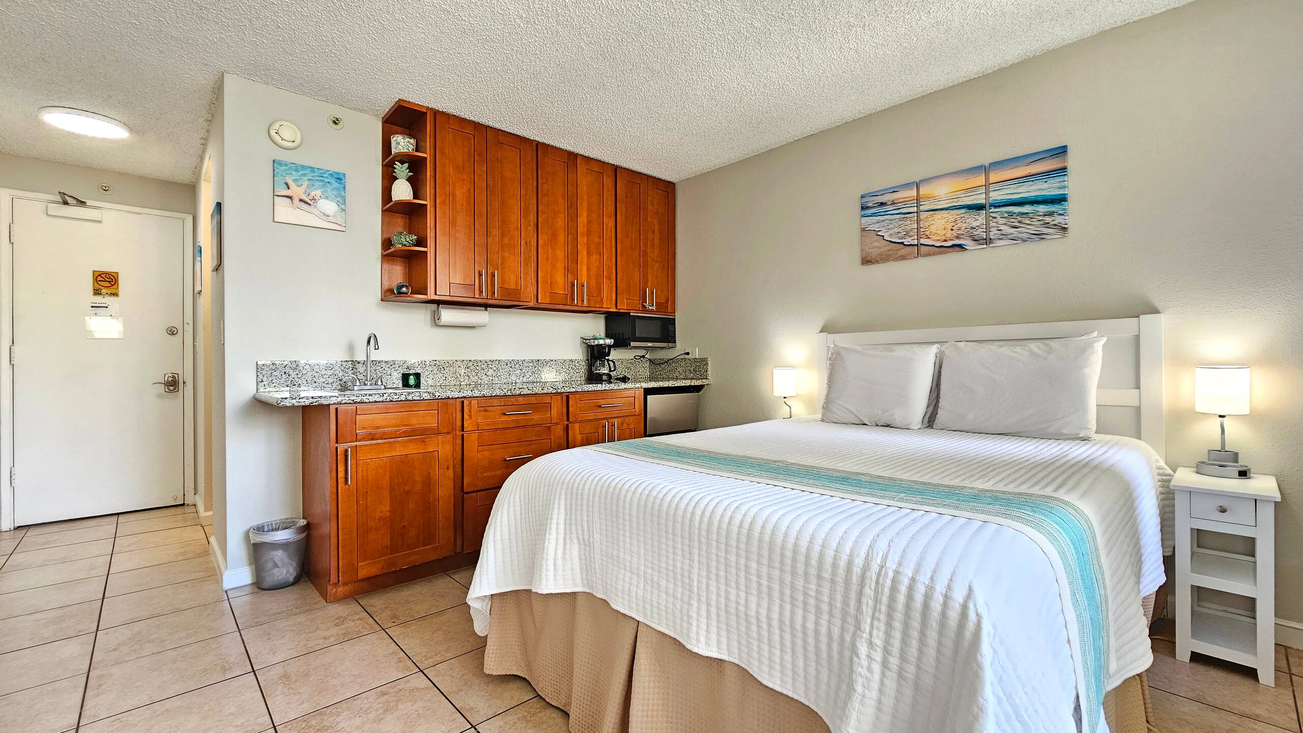 Chic Waikīkī Grand Studio | Lanai, Pool, Kitchen - Image 1