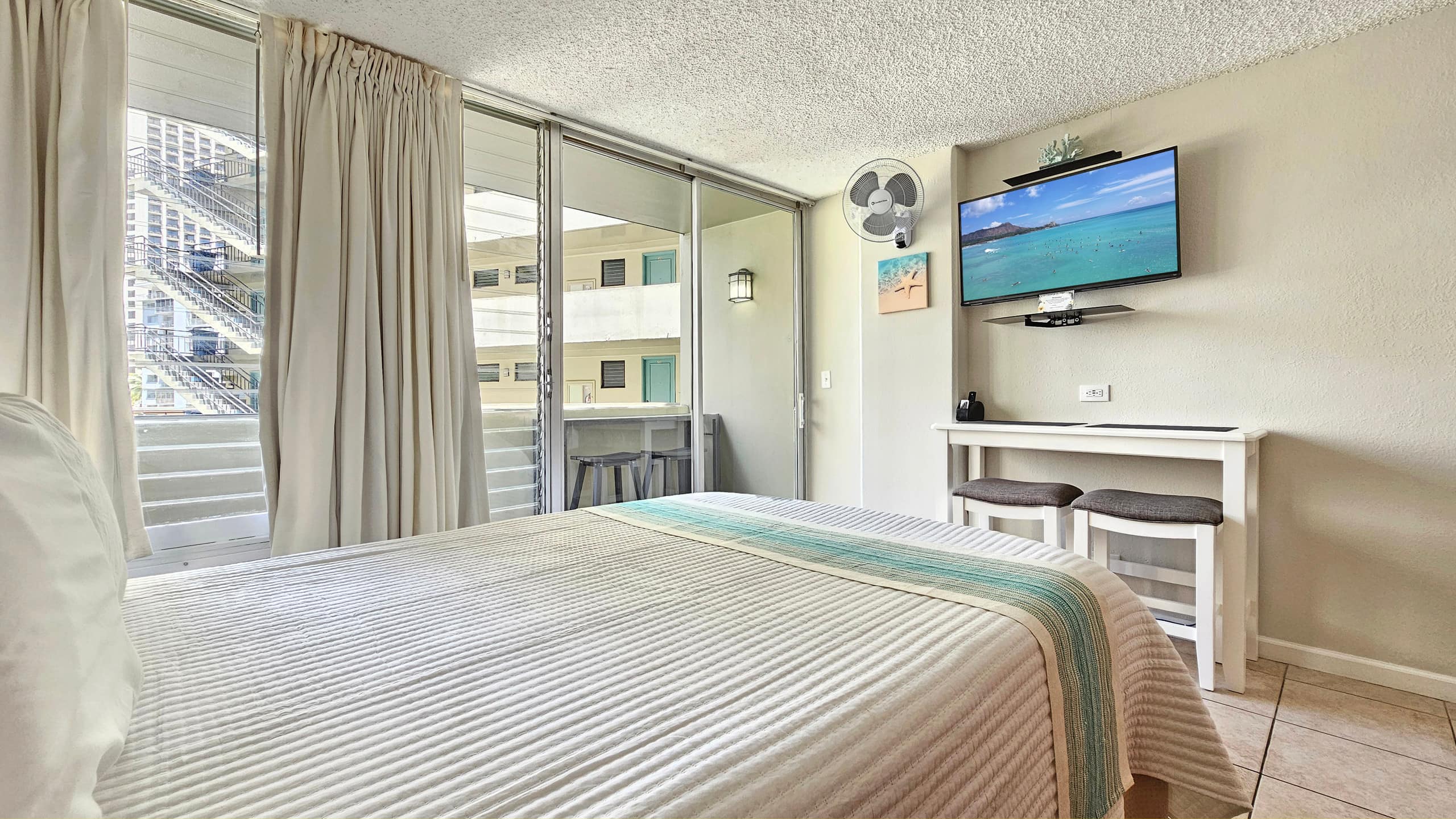 Chic Waikīkī Grand Studio | Lanai, Pool, Kitchen - Image 42
