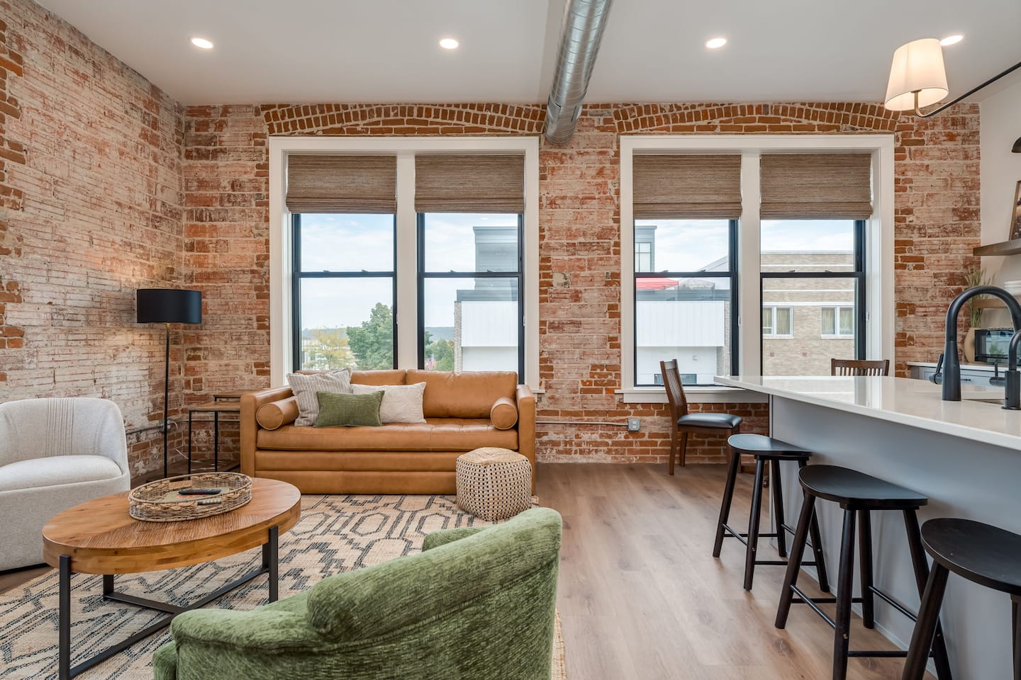 Fragrance-free loft in historic downtown New Ulm with exposed brick and tall windows