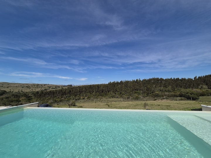 Cabin in the Sierras for exclusive use.
Pool off.