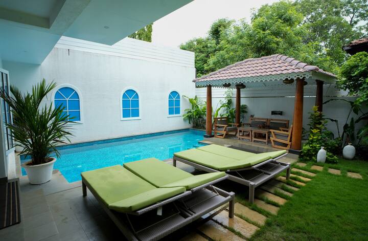 ELIVAAS Bauhinia VK · Luxury 4-BHK Villa | Pool & Garden Retreat