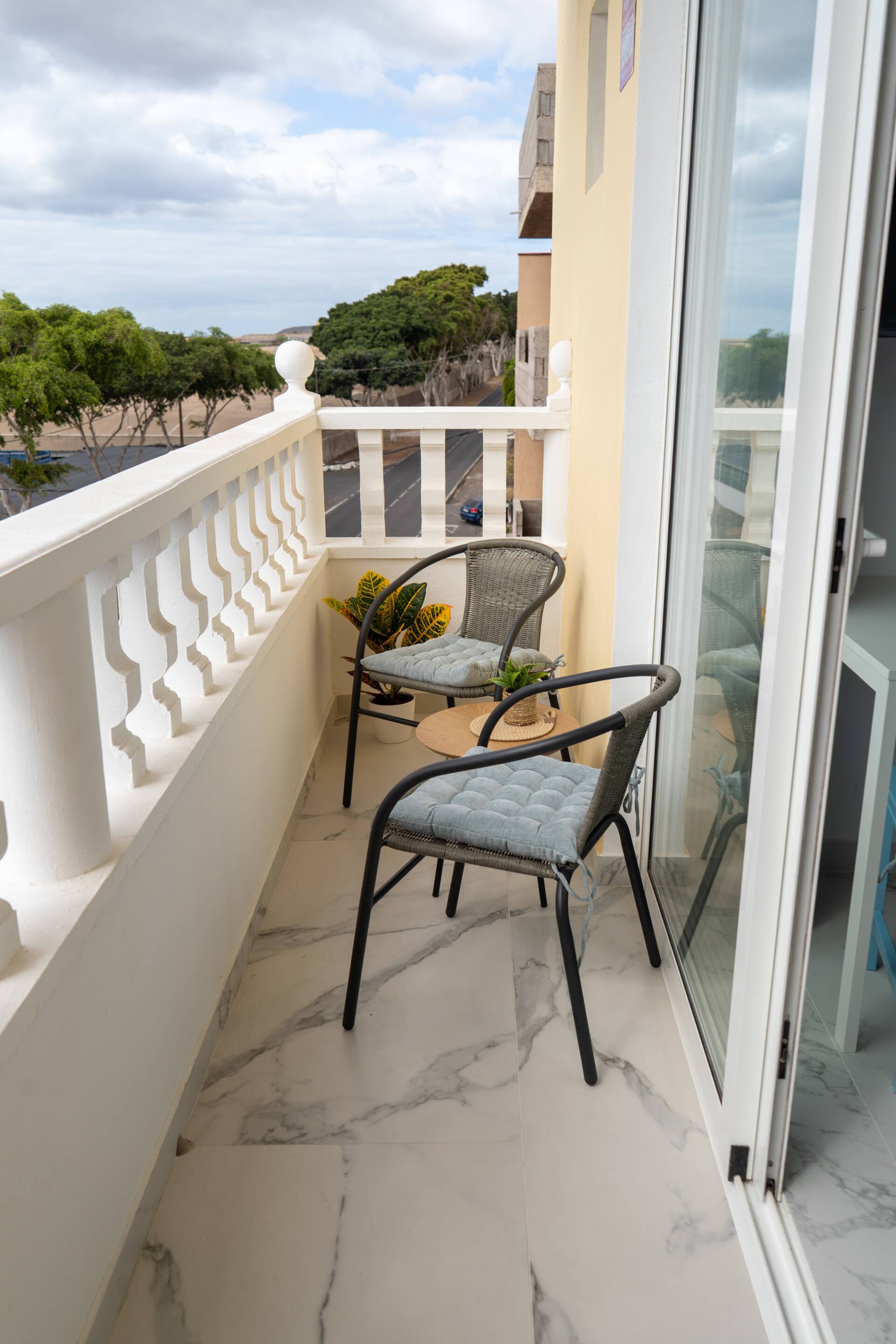 Panoramic Balcony: Sea and Sunsets.