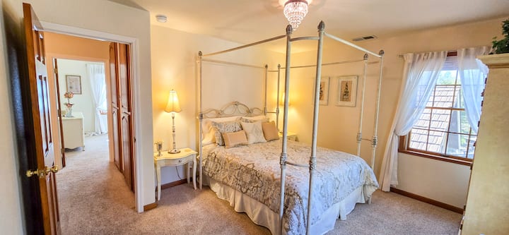 With French Country warmth, the playfully named Cinderella Room awaits all guests!