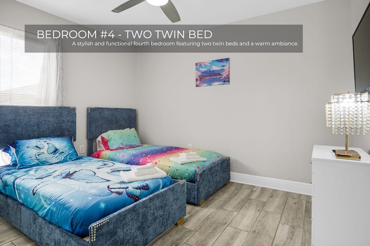 Удобна и пријатна четврта спална соба со два единечни кревета за удобен престој.