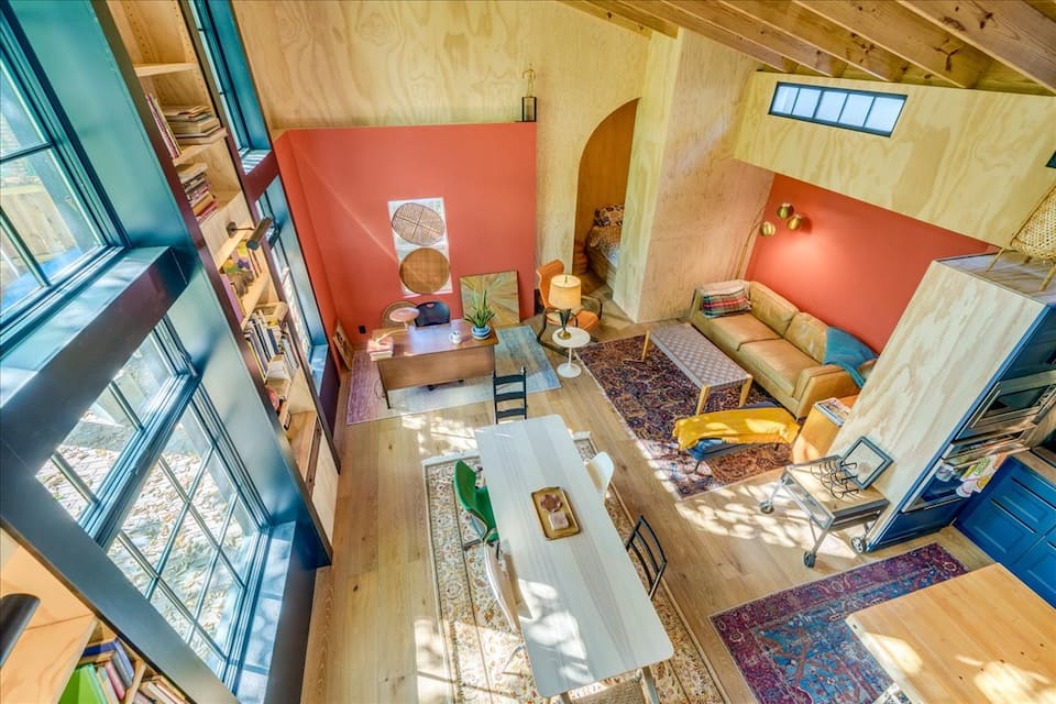 Tiny home living room with floor-to-ceiling windows