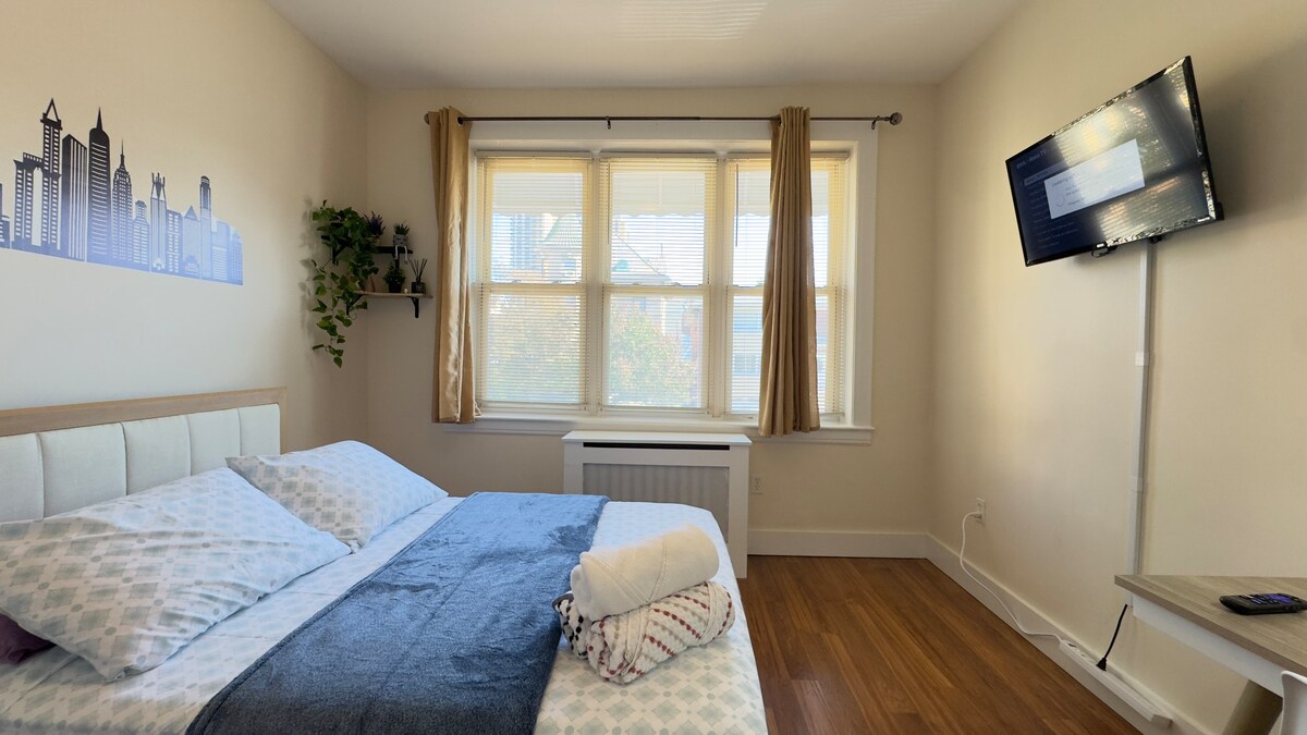  Wakker worden met zonneschijn. Een rustige, luchtige ruimte ontworpen voor comfort en ontspanning. 