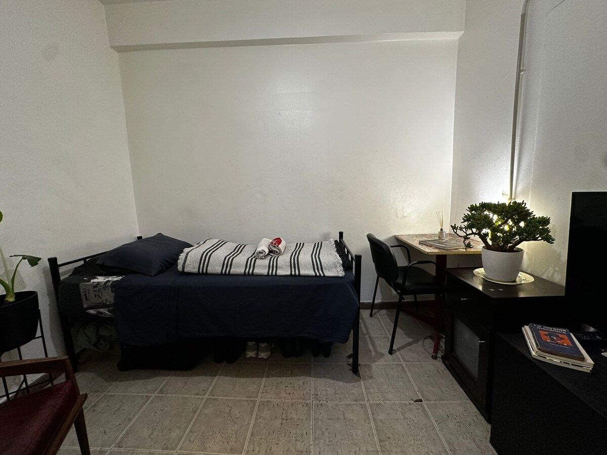 Quarto individual em apartamento em Palermo
