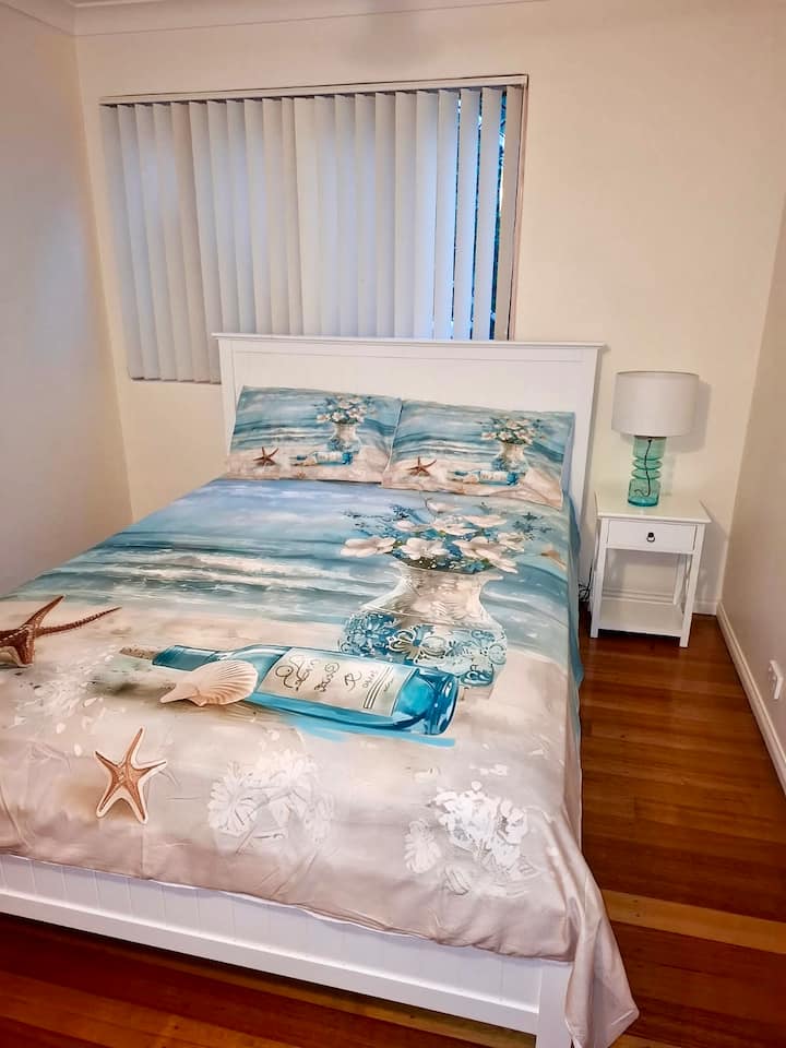 Downstairs bedroom 2 has a queen size bed and is air conditioned.