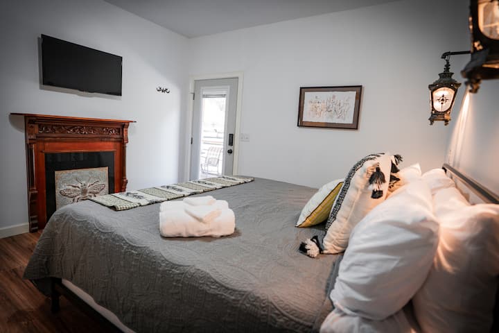 Master Bedroom with direct access to back patio and hot tub area