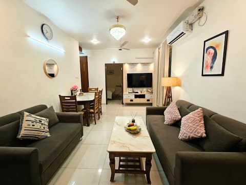 Cherry Blossom Hideaway|Elegant 3BHK Cozy Ambience