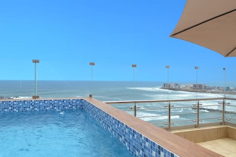 Modern duplex with private pool and ocean views.