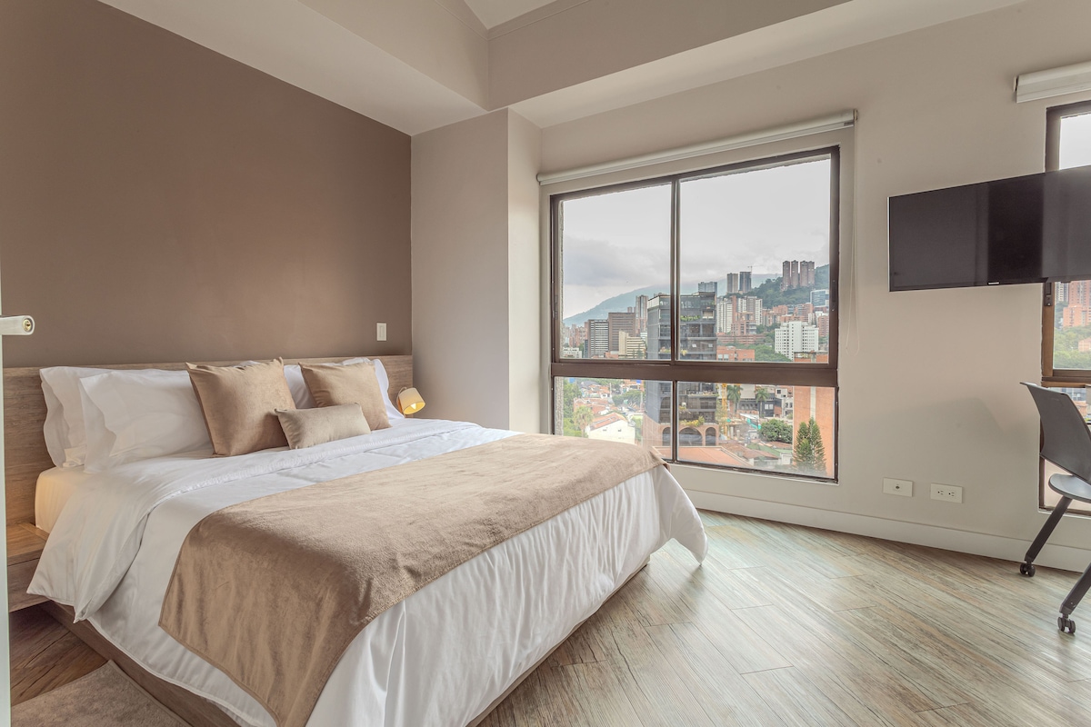 Top floor bedroom with mountain views and terrace access