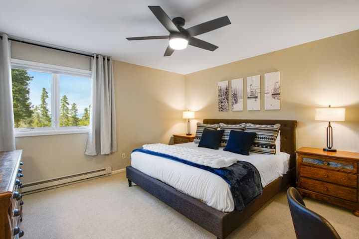 Bedroom #1 boasts King bed, Mountain views, Ceiling Fan, Smart TV, En Suite bathroom, Large Closet.