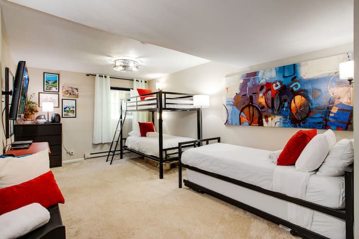 3rd Bedroom Sleeps 4 in individual twin beds.  1 twin bunk Bed, 1 Twin Trundle bed.  Trundle Twins can be raised up put together as a shorter King bed.  Toys provided under bed and in closet.
