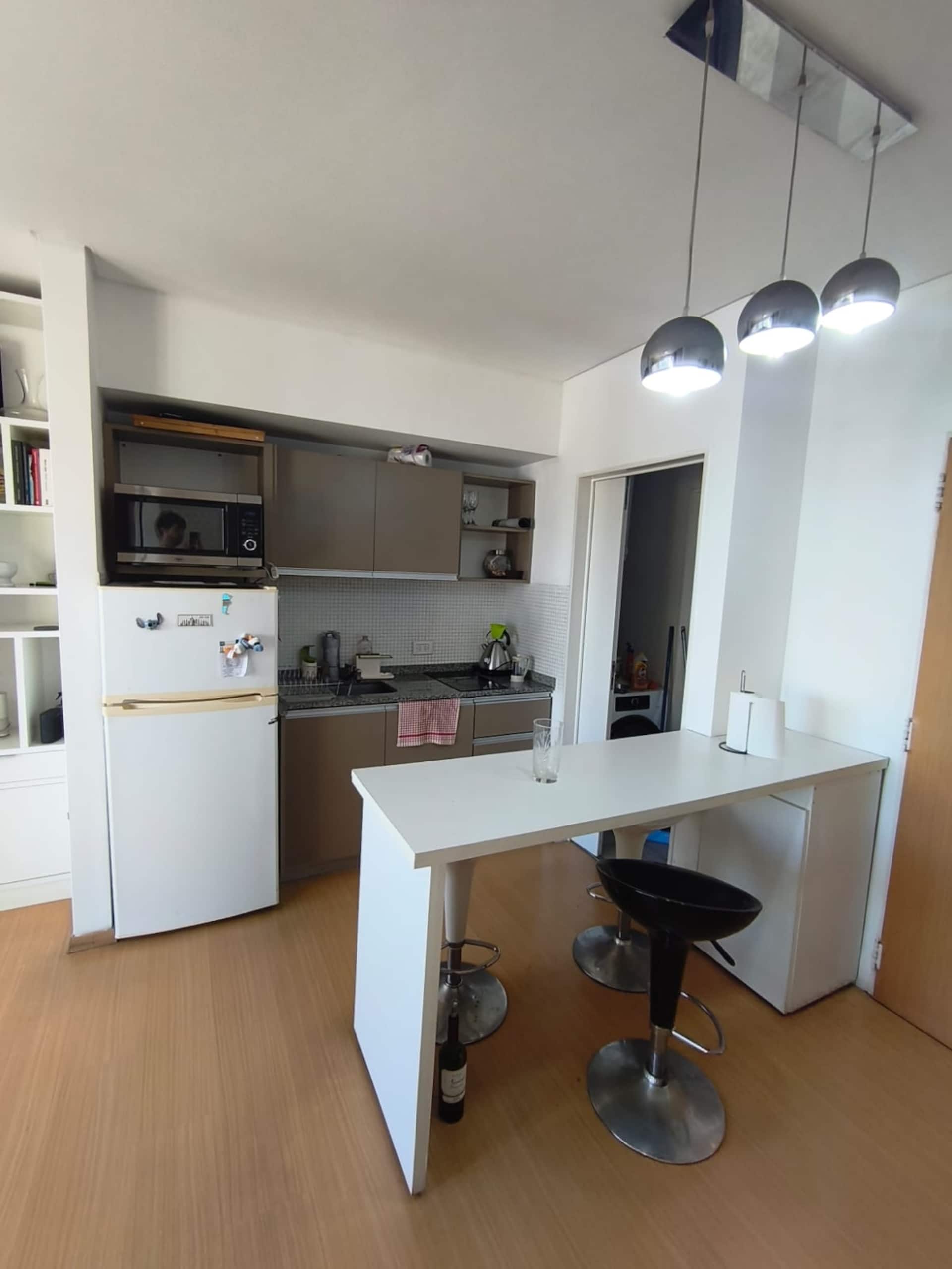 Modern and bright studio with balcony