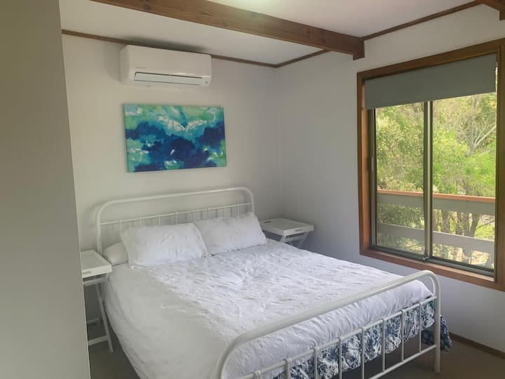 Cama tamaño queen