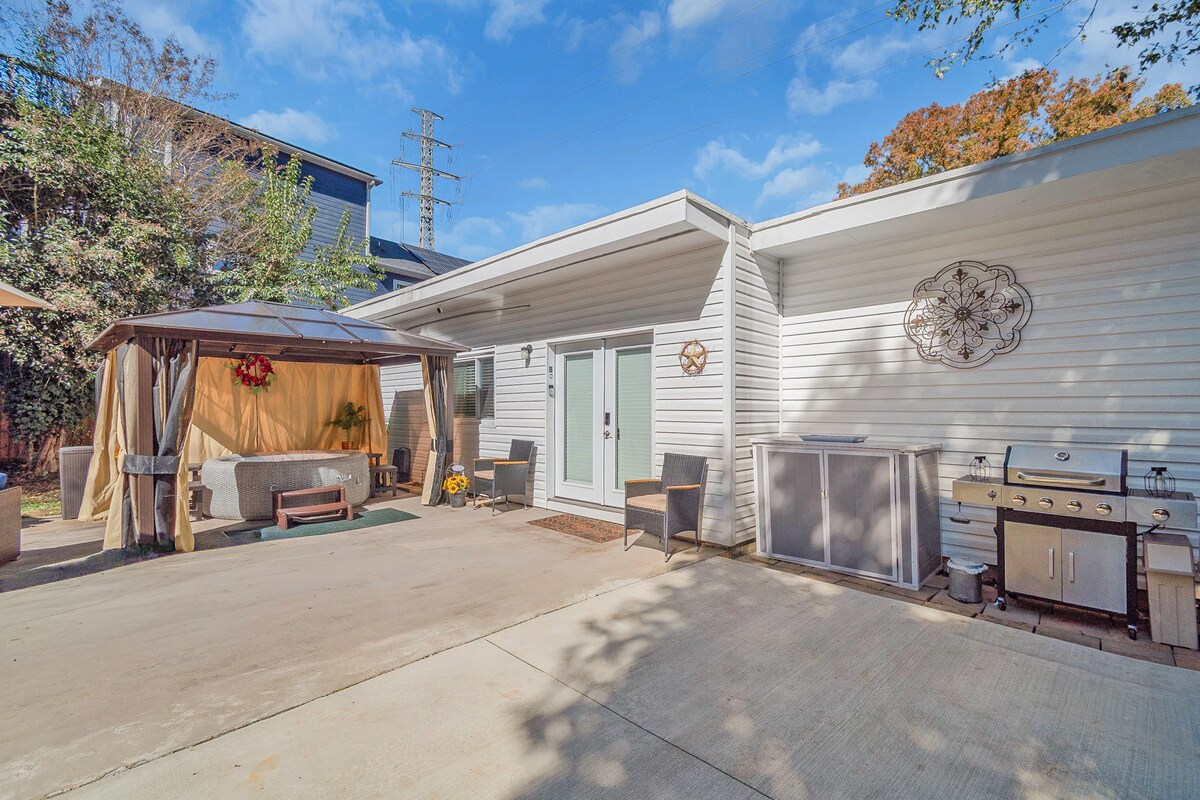 Suite exterior with hot tub gazebo