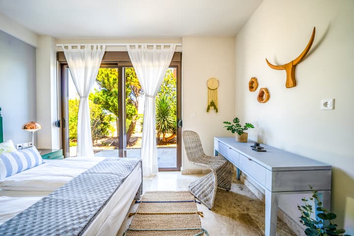 Lower Floor: Bedroom 2 with king bed, ensuite bathroom and terrace access