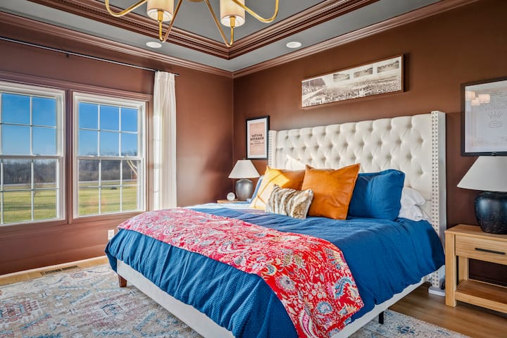 Escape to the manor’s crown jewel: Our grand master suite. Sink into the plush king-sized bed under an elegant tray ceiling—the ultimate private retreat for rest and refinement. ✨
