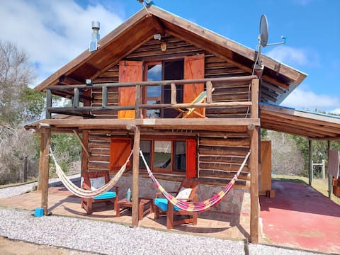 Beautiful cabin a few meters from the beach.