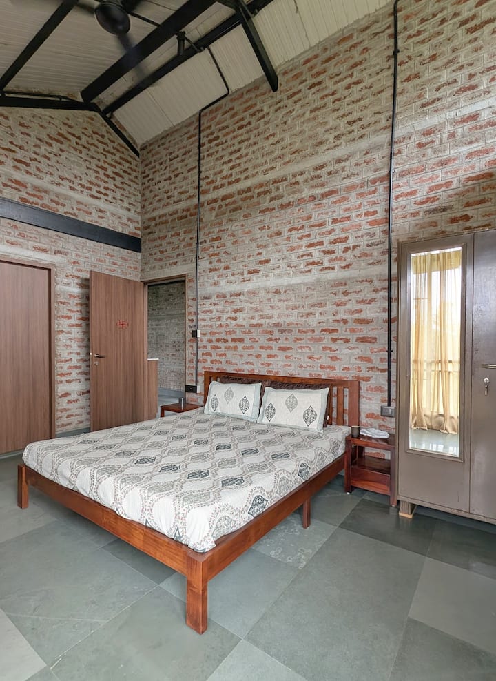 A peaceful hideaway with an attached modern bathroom.
Each bathroom follows international dry/wet demarcation standards and is equipped with instant geysers and pressure pumps 
(functional except during extended power cuts).