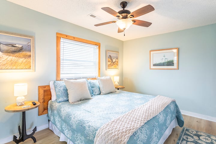 Master bedroom with a master bath, jacuzzi, king size bed, tv, and closet