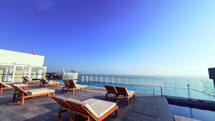 “Ocean View | Self Check-In | Infinity Pool”.