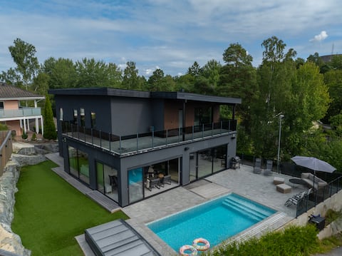 Architect-designed villa with pool, spa & cinema