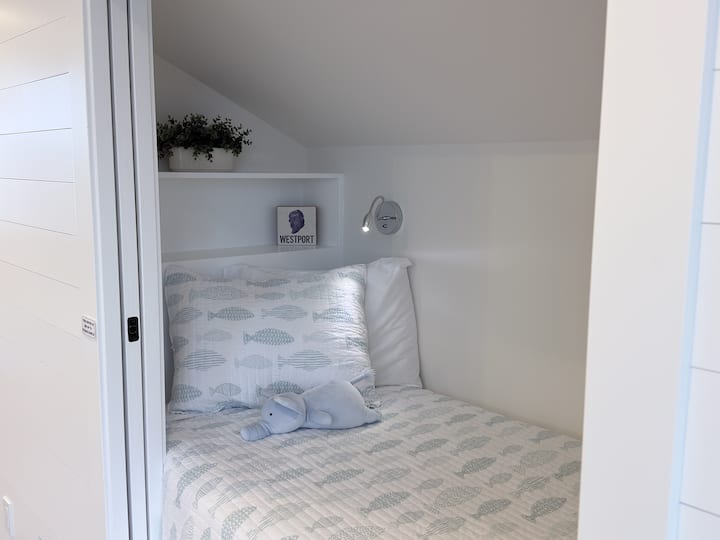 Each twin bed has a stuffed friend waiting to hear about your coastal adventures. 