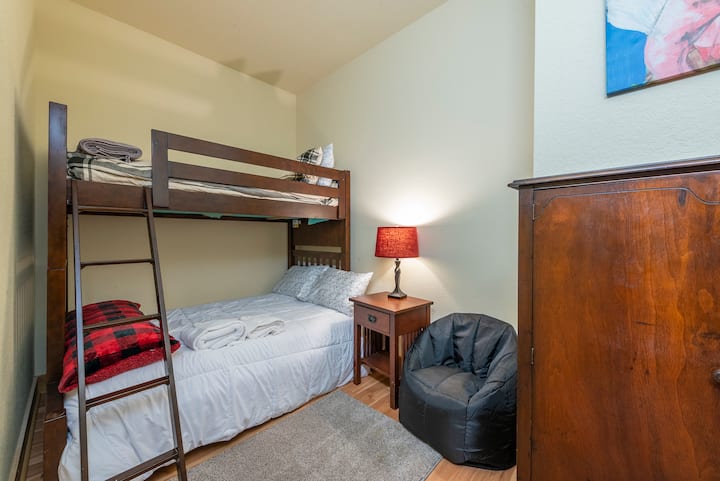 This cozy little room has a bunk bed for the kiddos to enjoy!