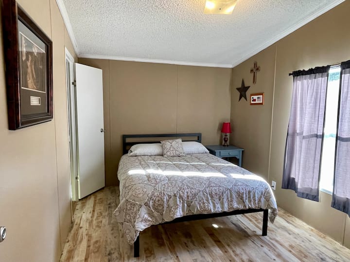 This queen bed has a new, memory foam mattress.
