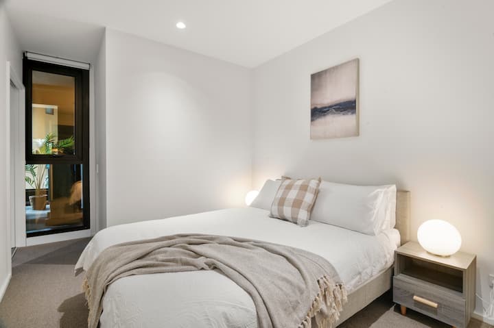 Queen sized bed with full bedding supplied. Two bedside tables and a built in wardrobe.