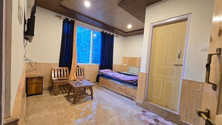 Mountain and forest view from the Hils & Paw lawn and patio area