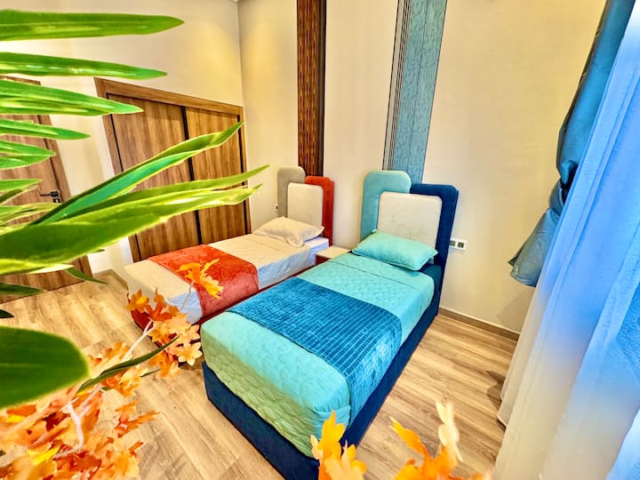 غرفة نوم ثانية بسريرين 90 × 190 
مثالية للرحلات العائلية 