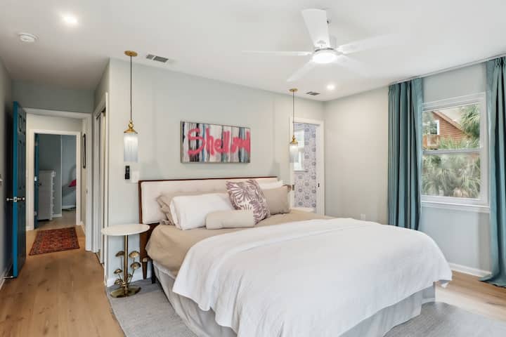  Shell Yeah Master Suite! Relax in the serene Shell Yeah Master, featuring a king bed, soft coastal tones, and private patio access. Calm, cozy, and designed for peaceful beach mornings and restful nights. 