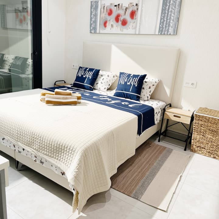 Spacious master bedroom with a comfortable double bed, air conditioning, fitted wardrobes and an en-suite bathroom. The beds can also be separated on request