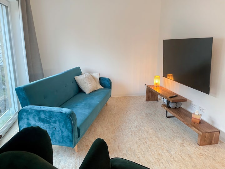 Brand-new living room featuring abundant natural light and modern design