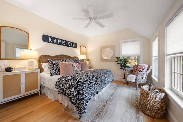 Carriage house king bedroom with closet and serene ambiance.