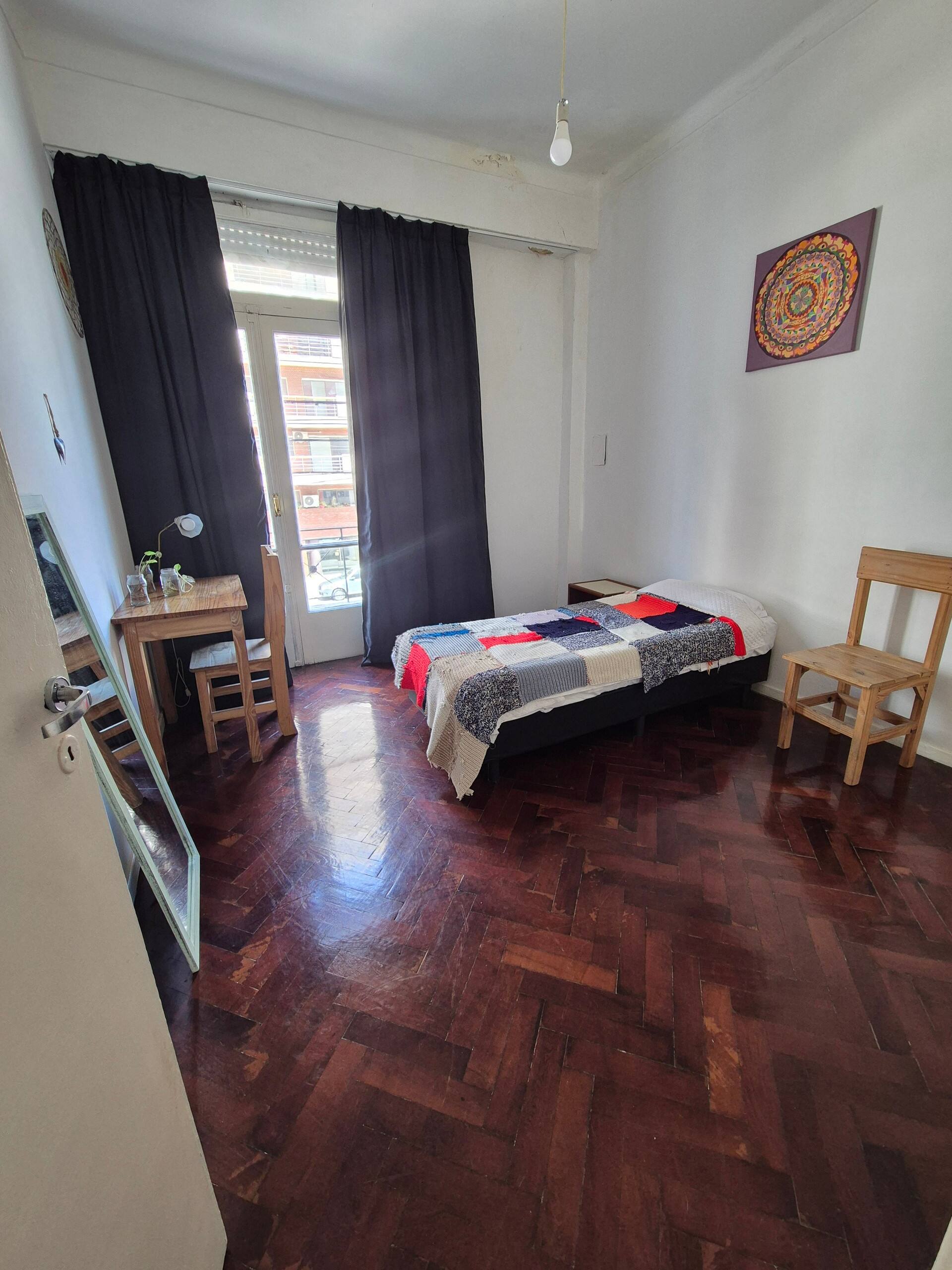 Room in an apartment in Villa del Parque