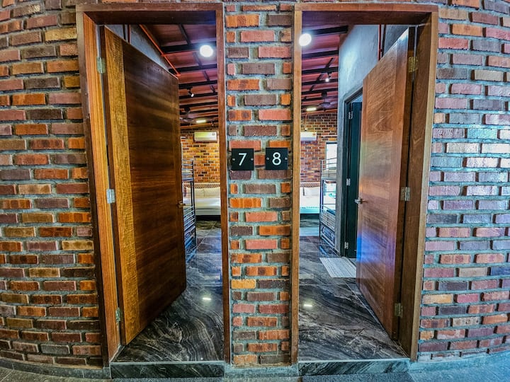 Doors 7 & 8. Step into one of our largest rooms, directly across from the next. Perfect for booking a large group together!