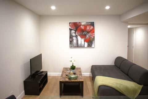 Top Airbnb: Bright Modern Walkout Basement Suite 8ft Ceilings in Meadowvale