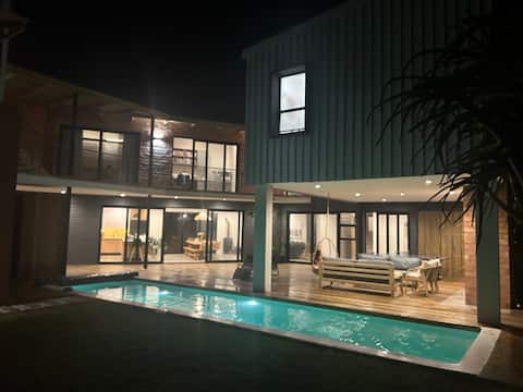 Modern beach home with lap-pool & hot tub