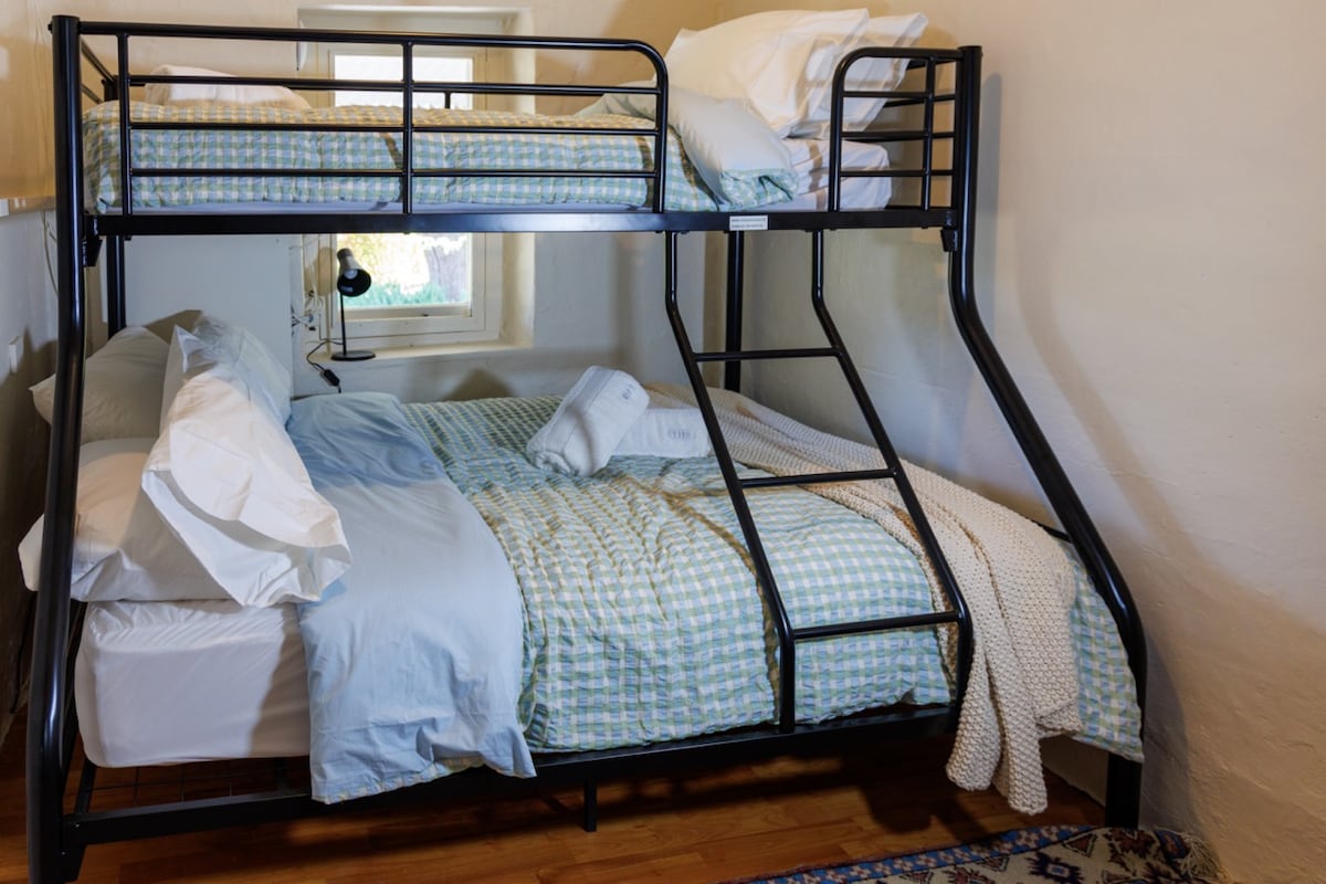 The bunk room is designed for kids, but will accommodate adults, too. 