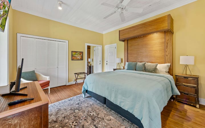 Beautiful king bedroom located in the main house providing comfort and a cozy atmosphere for your stay. En-suite bathroom.