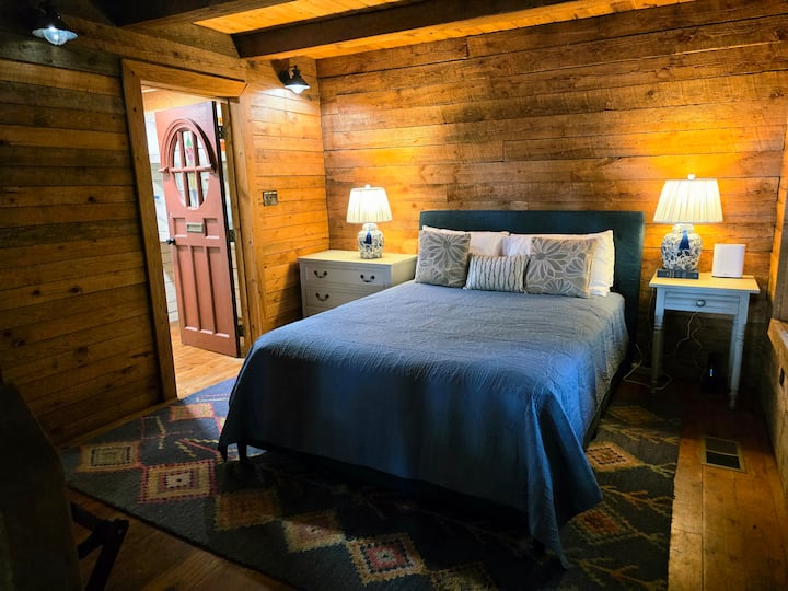 Downstairs bed. This is an open den area off of the main living room.  There is a bathroom/laundry room attached to this space but there is door on this space for exclusive privacy.