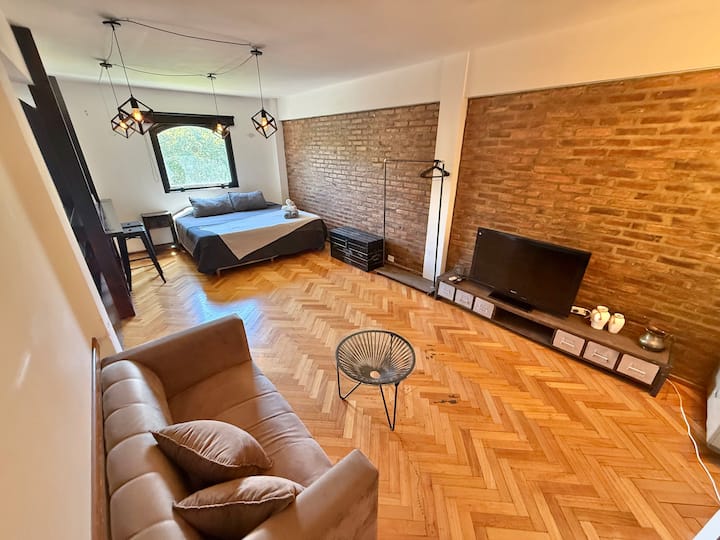 Apartamento estilo industrial com cama king size em Puerto Madero