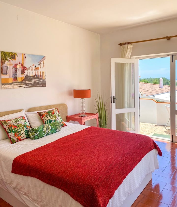 Bedroom 4 is the family bedroom in the main house, with 2 single beds and a king.  It has its own ensuite bathroom with shower over bath, and doors onto a private balcony with steps down to the pool.