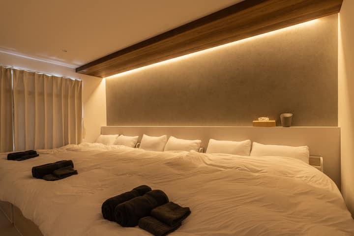 Rest deeply after a day of adventure. We provide high-quality linens and a quiet atmosphere to ensure you wake up refreshed and ready for another day in Osaka.