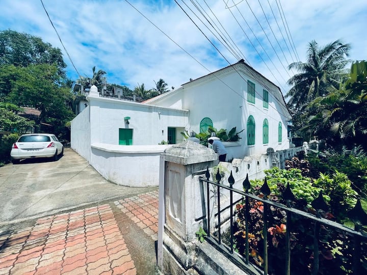 Experience the charm of old Goa in this Portuguese-style villa, featuring high ceilings, elegant architecture, and modern comforts for a truly relaxing stay.