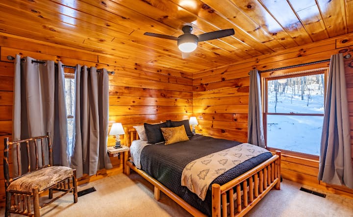 Queen bed with plush topper for extra comfort. Downstairs bedroom